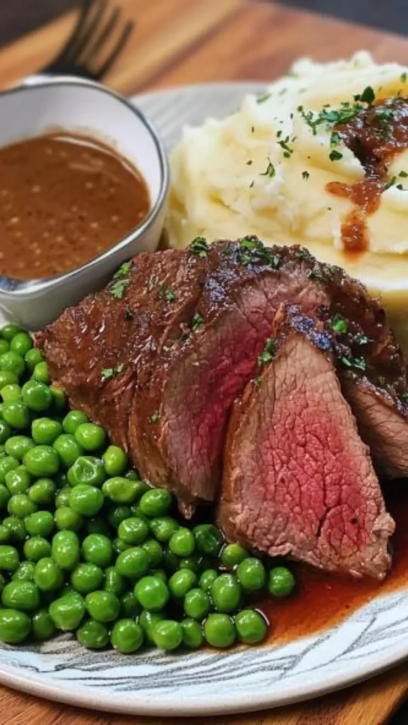 Roast Beef With Mashed Potatoes And Peas
